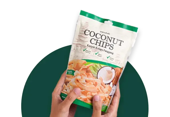 Hands holding a pack of Merubali Coconut Chips Original